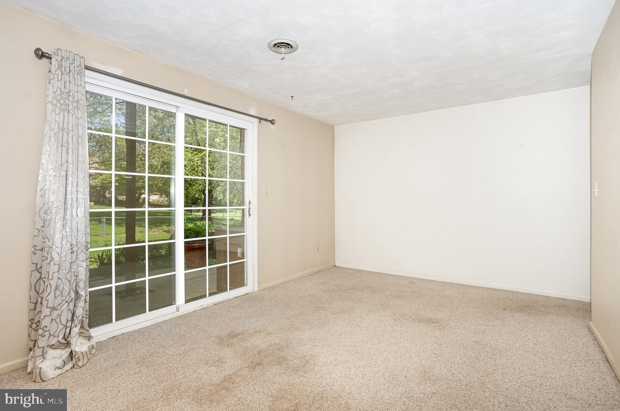 415 Weldon Drive York, PA 17404 - Photo 20 of 34 a view of an empty room with a window