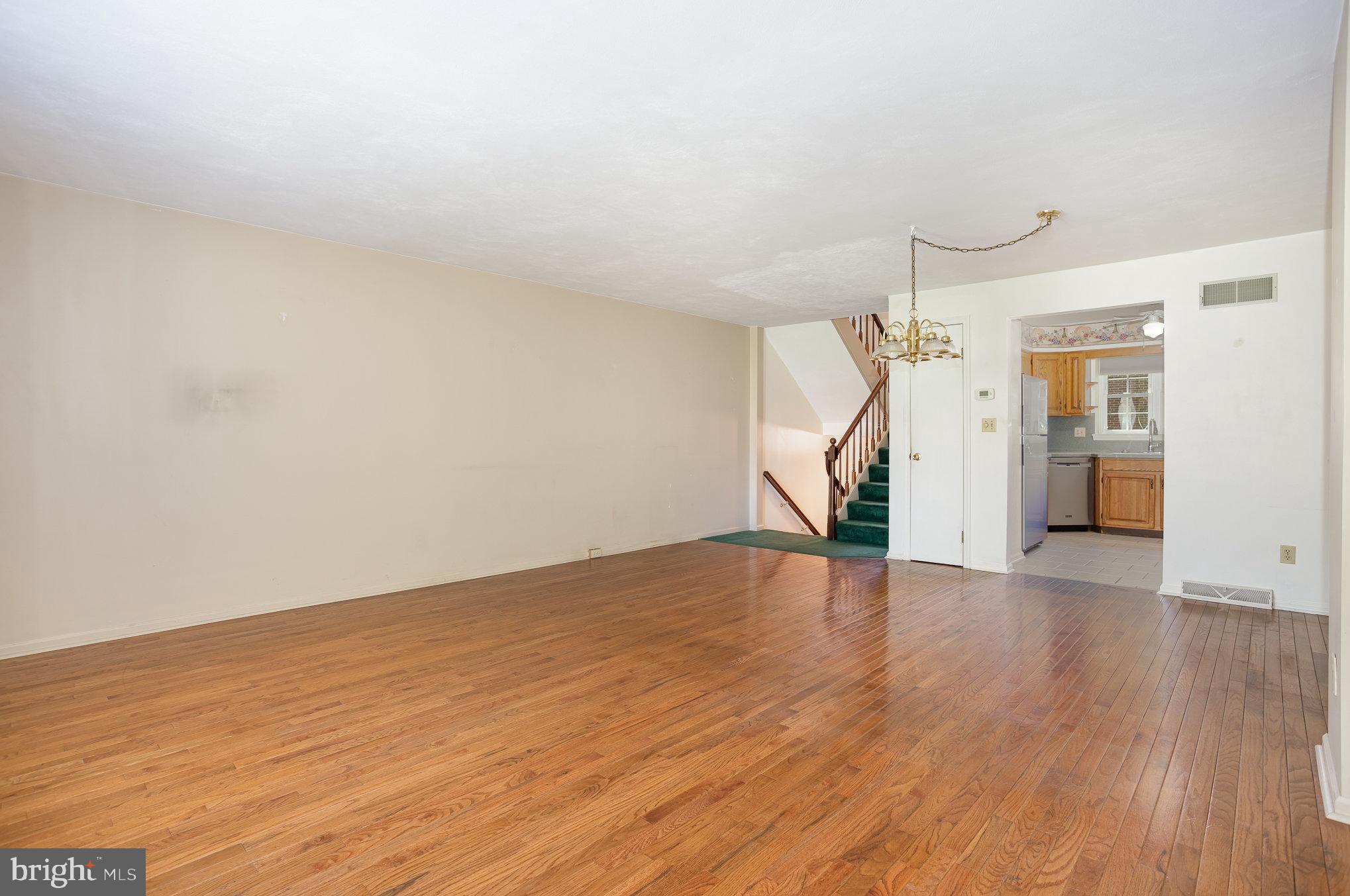 415 Weldon Drive York, PA 17404 - Photo 6 of 34 a view of empty room with wooden floor and fan