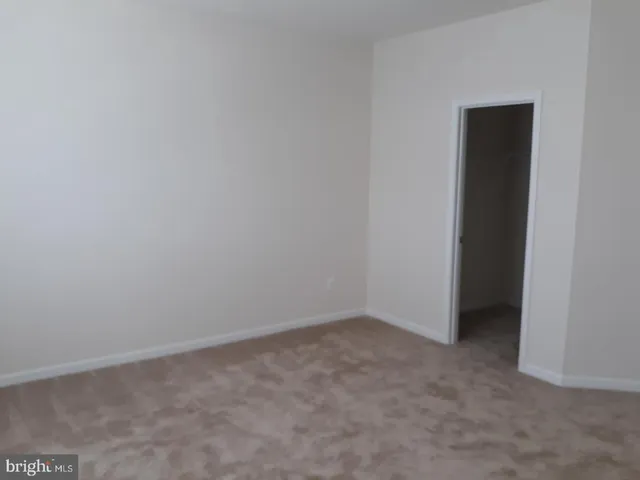 a view of a room that has a large window