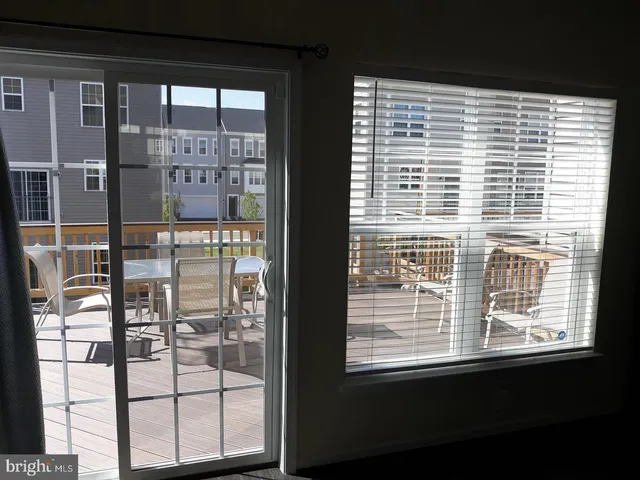 a view of kitchen island with wooden floor