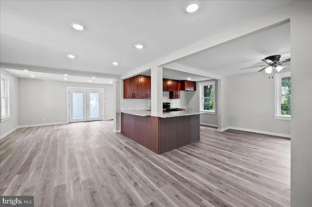 a view of kitchen and wooden floor