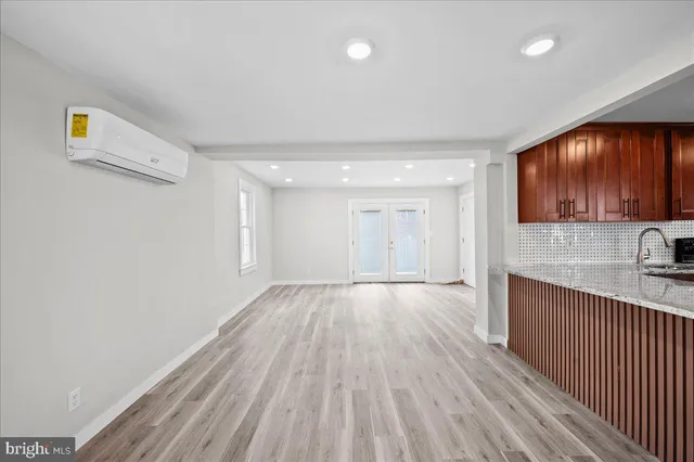 a view of a kitchen from the hallway