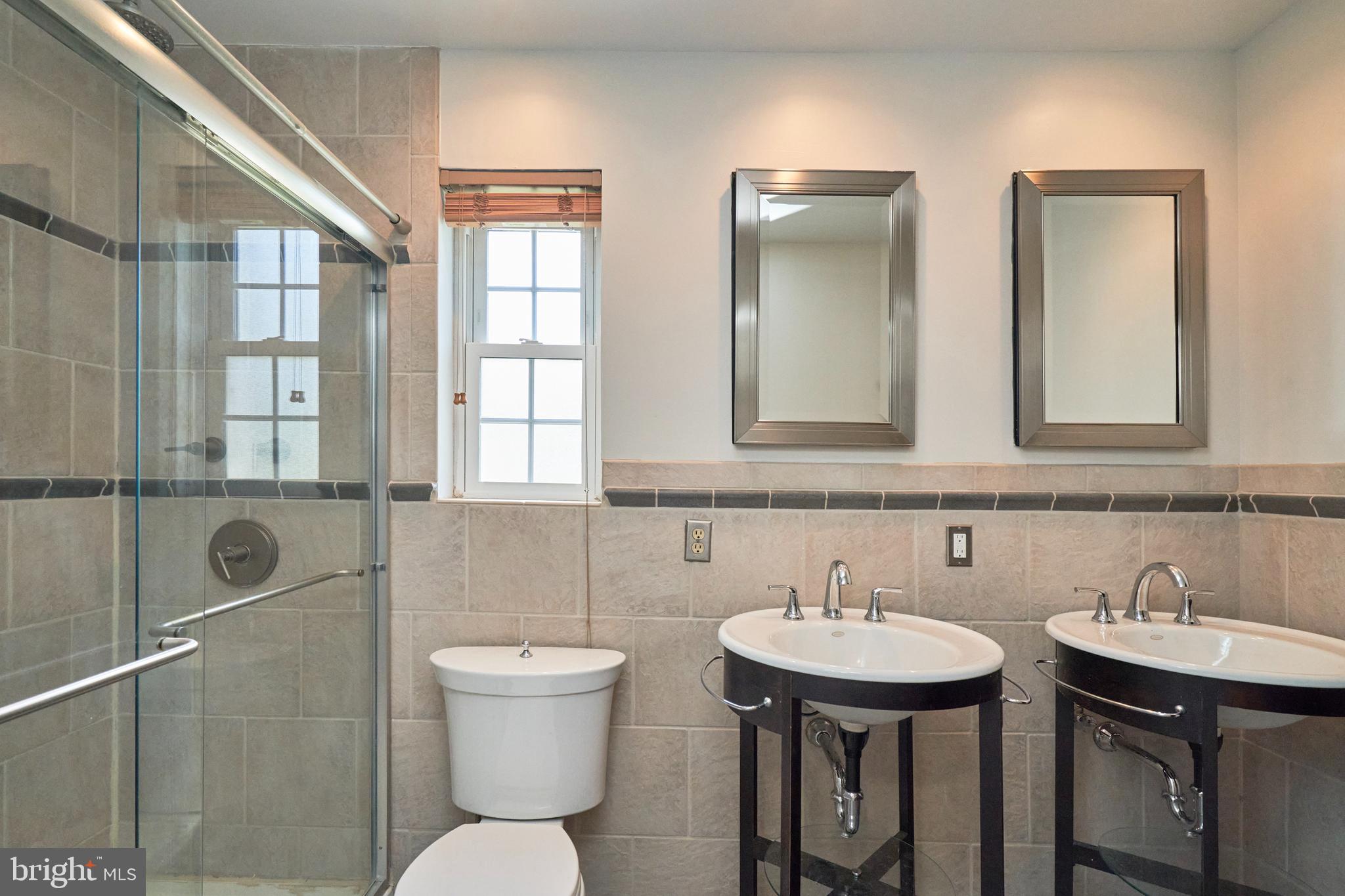 3314 Gunston Road, Unit 7303314 Alexandria, VA 22302 - Photo 15 of 42 Bath with walk-in shower and dual sinks