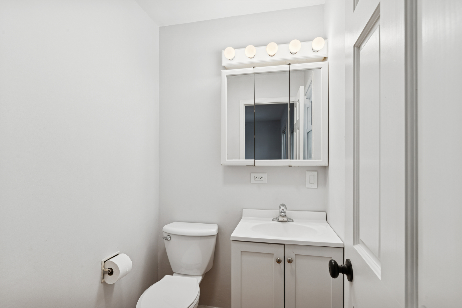 18 Greenview Road Oakwood Hills, IL 60013 - Photo 14 of 35 a bathroom with a sink a toilet and mirror