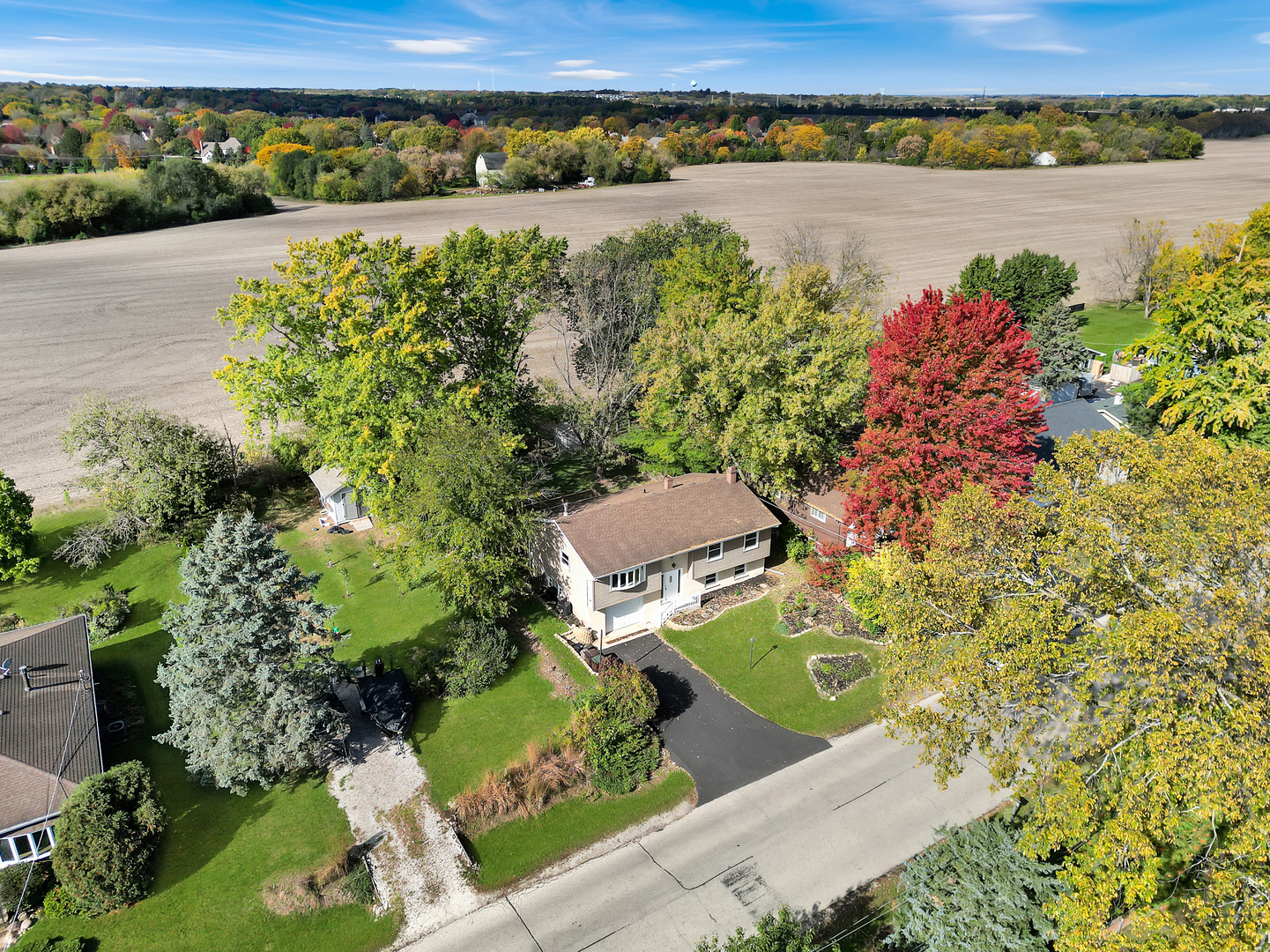 18 Greenview Road Oakwood Hills, IL 60013 - Photo 3 of 35 an aerial view of a house with a lake view