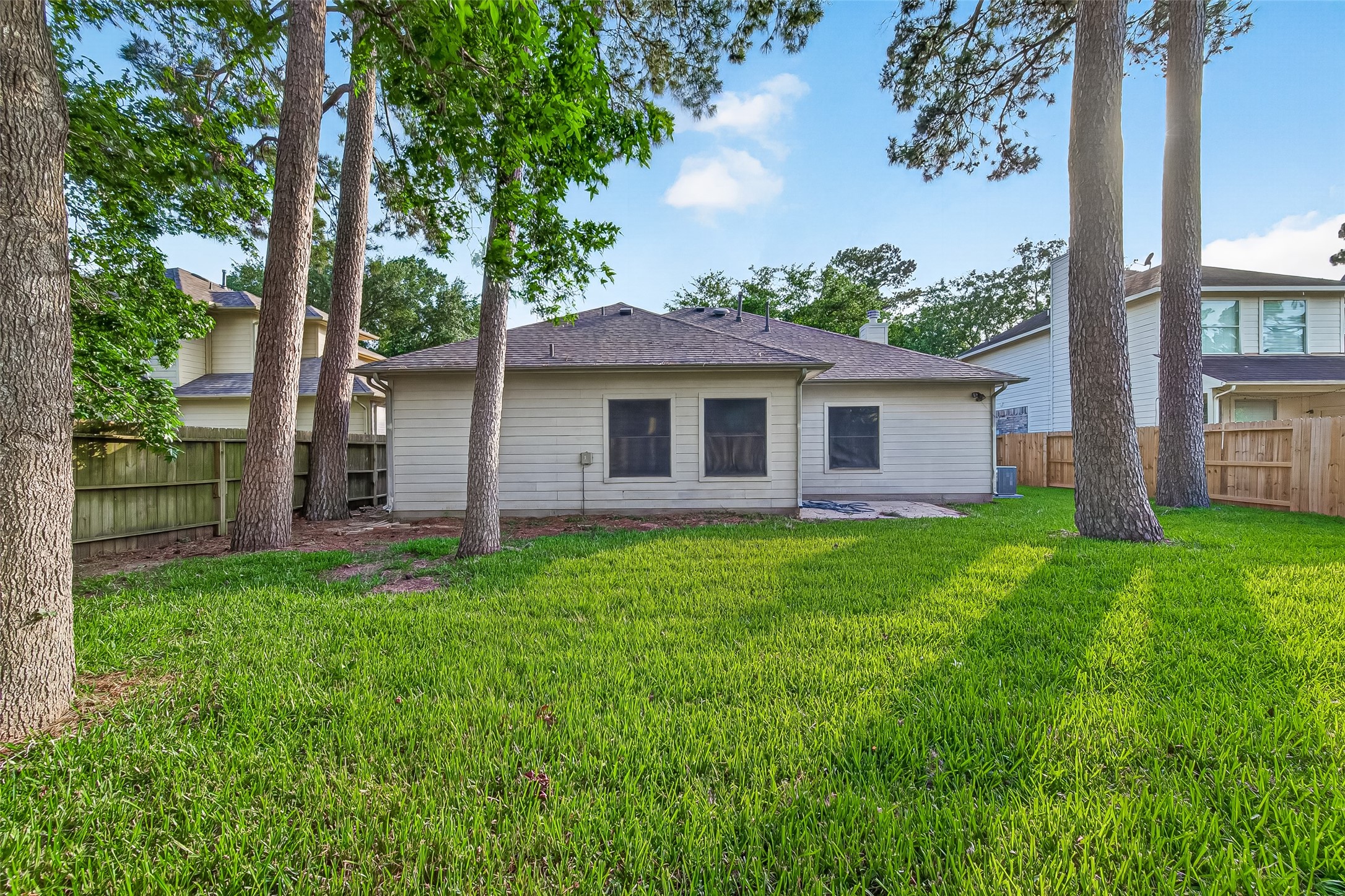 23810 Spring Way Drive Spring, TX 77373 - Photo 32 of 35 a view of a house with backyard and garden