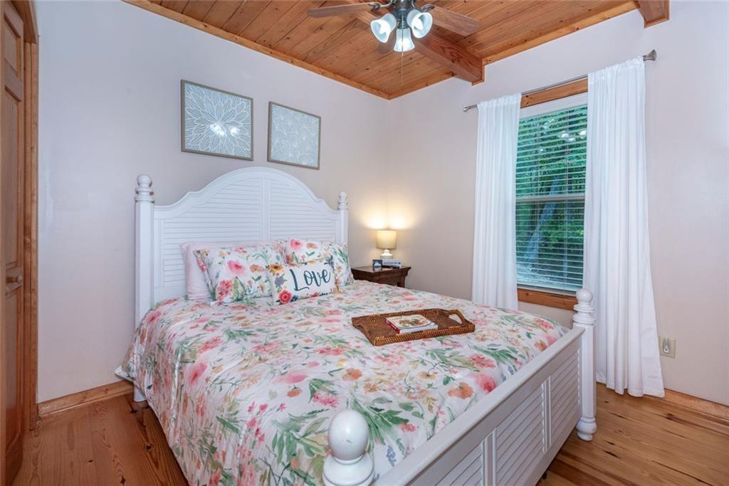 1328 Birch Lane Ranger, GA 30734 - Photo 13 of 33 a bedroom with a bed and a window