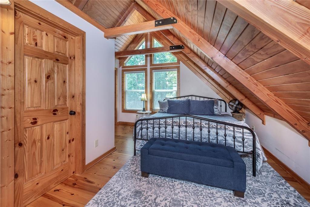 1328 Birch Lane Ranger, GA 30734 - Photo 16 of 33 a bedroom with a bed and a window