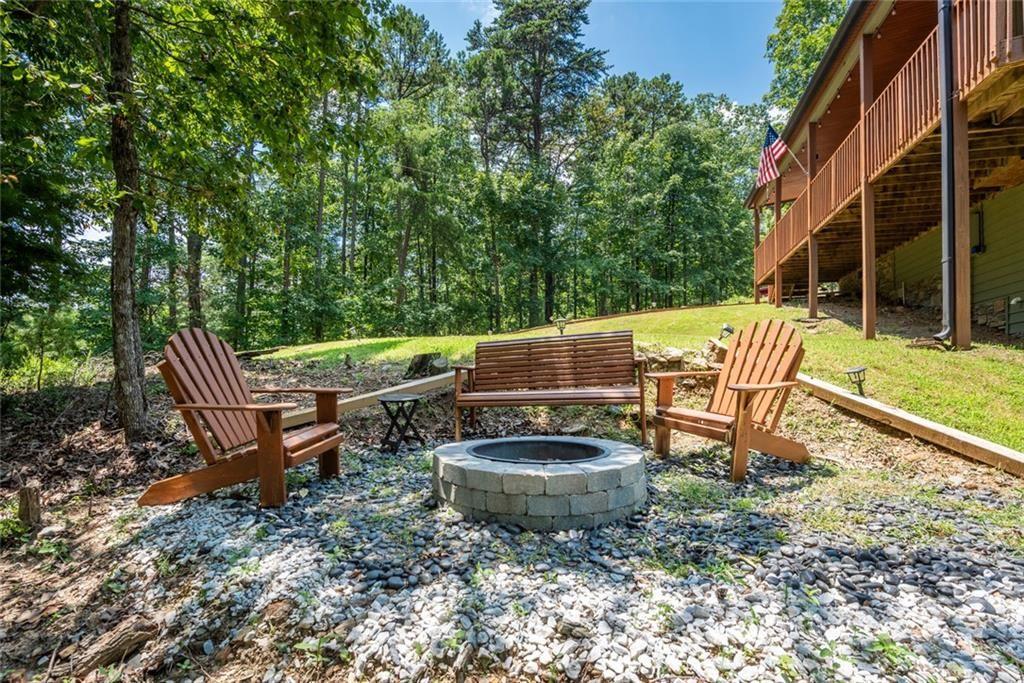 1328 Birch Lane Ranger, GA 30734 - Photo 21 of 33 a view of a backyard with sitting area and furniture