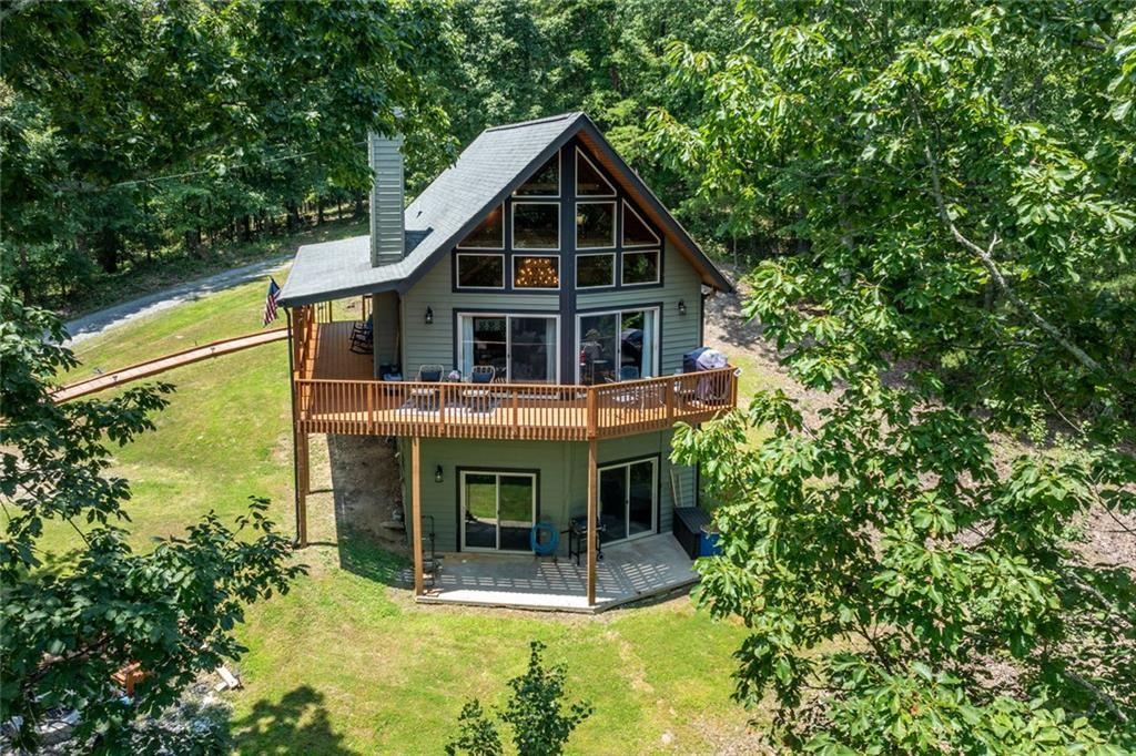 1328 Birch Lane Ranger, GA 30734 - Photo 22 of 33 a view of a house with brick walls and a yard with plants
