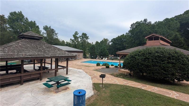 1328 Birch Lane Ranger, GA 30734 - Photo 23 of 33 a terrace with outdoor seating and trees