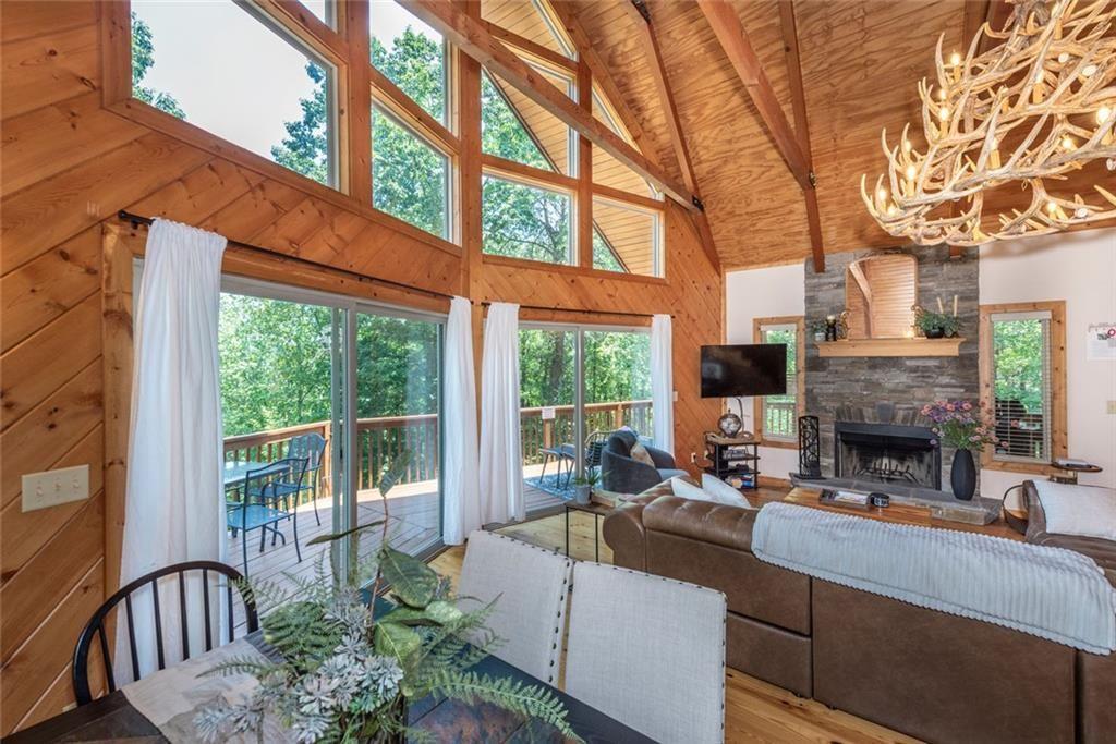 1328 Birch Lane Ranger, GA 30734 - Photo 9 of 33 a outdoor living space with furniture and a fireplace