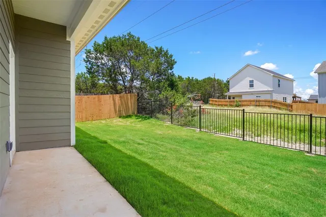 a view of a backyard with a garden