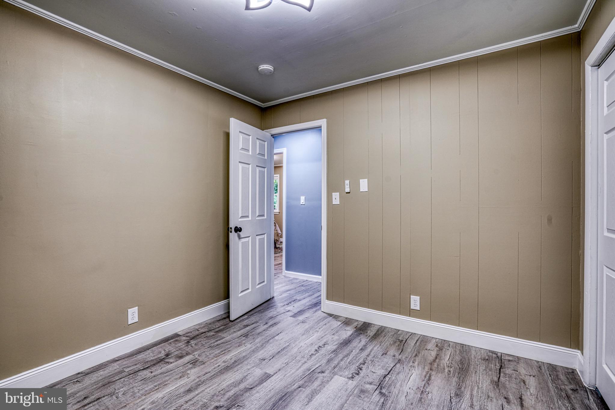 18 Oak Street Cambridge, MD 21613 - Photo 30 of 43 a view of an empty room