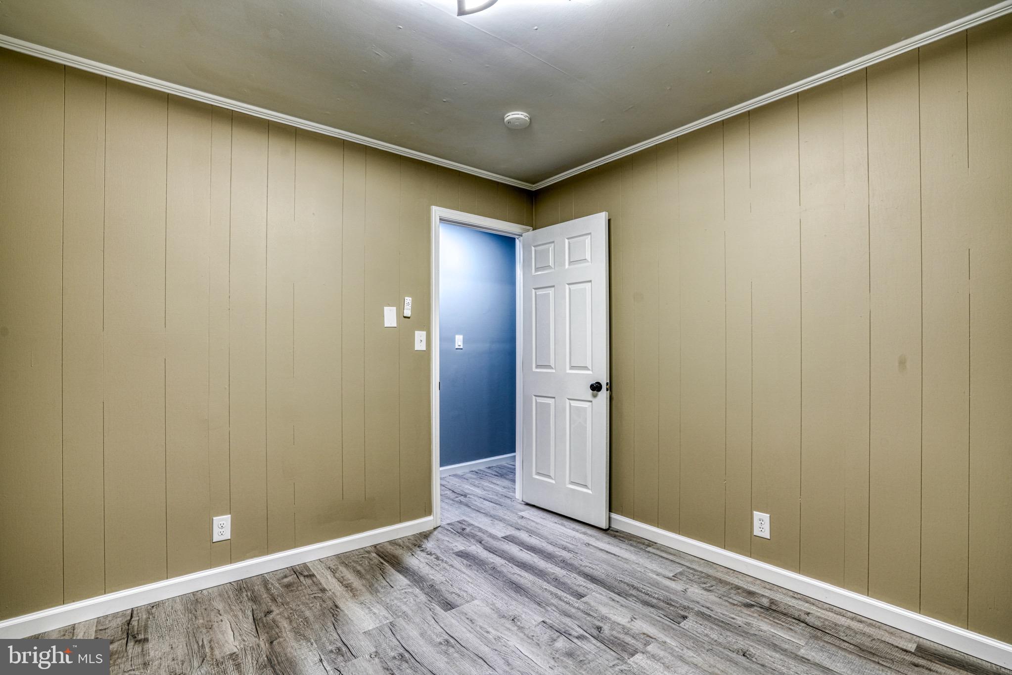 18 Oak Street Cambridge, MD 21613 - Photo 32 of 43 a view of an empty room