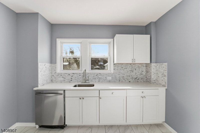 209 Vine Street Delanco, NJ 08075 - Photo 14 of 43 a bathroom with a sink and a mirror