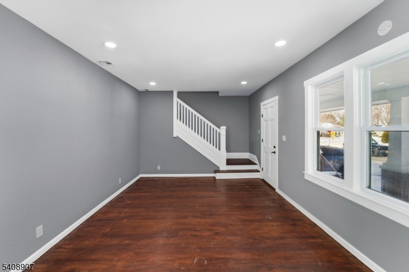 209 Vine Street Delanco, NJ 08075 - Photo 2 of 43 wooden floor in an empty room with a window