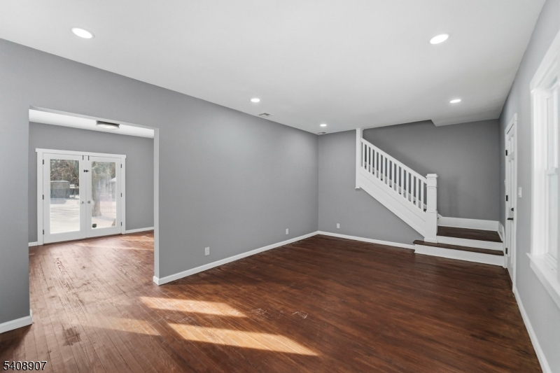 209 Vine Street Delanco, NJ 08075 - Photo 3 of 43 an empty room with wooden floor and windows