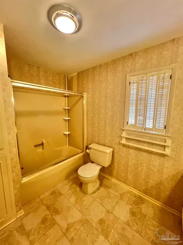 a bathroom with a sink and a shower