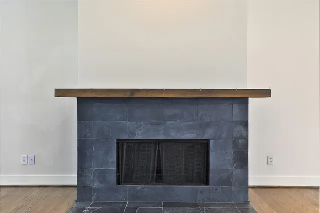 a living room with a fireplace