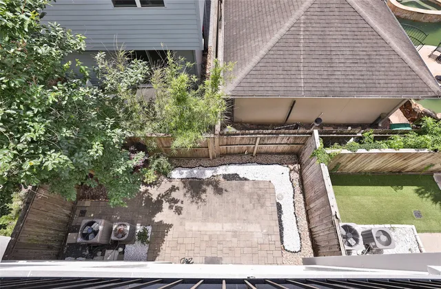 a view of a back yard of the house