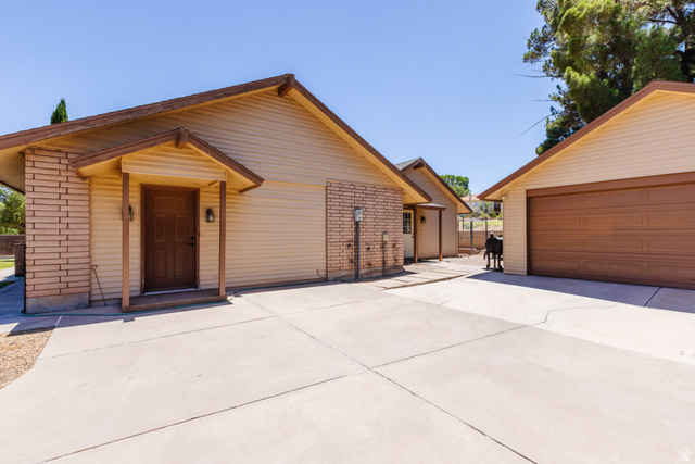 1470 Redwood Tree Street St. George, UT 84790 - Photo 35 of 53 Expansive concrete driveway servicing multiple structures