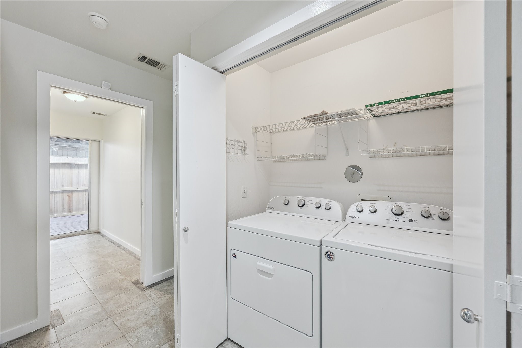 1617 Tuam Street Houston, TX 77004 - Photo 14 of 35 Full size washer and dryer and right behind is the Mud room that leads to the finished patio on first floor