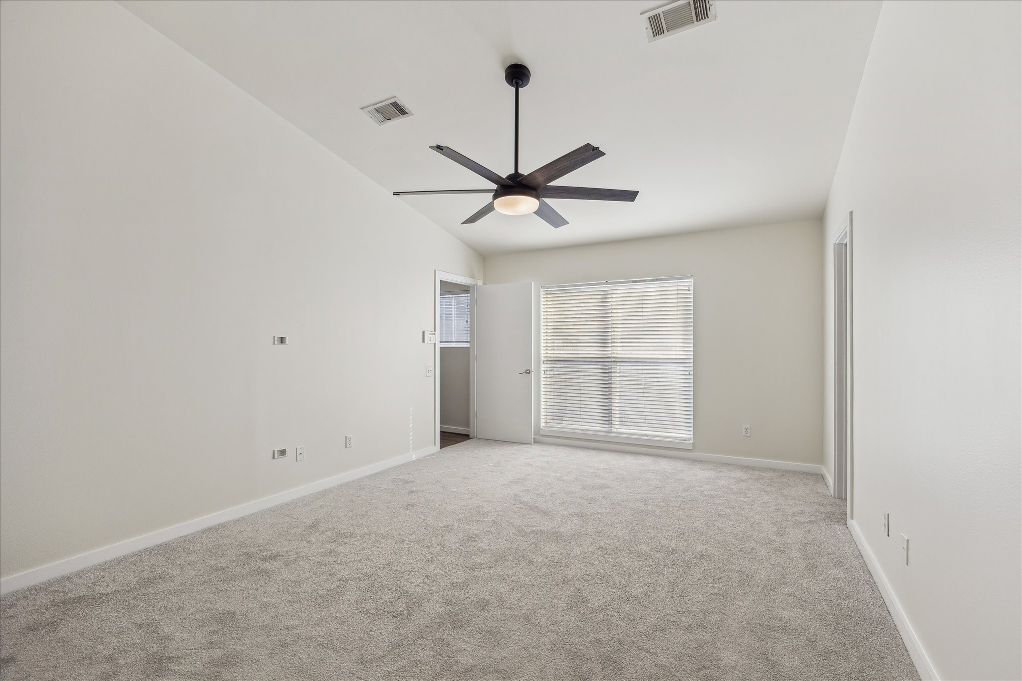 1617 Tuam Street Houston, TX 77004 - Photo 15 of 35 Freshly updated bedroom with new carpet and neutral colors that complement any décor.