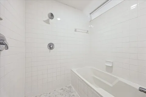 a bathroom with a bathtub