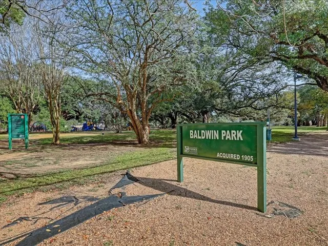 a sign board with parking space
