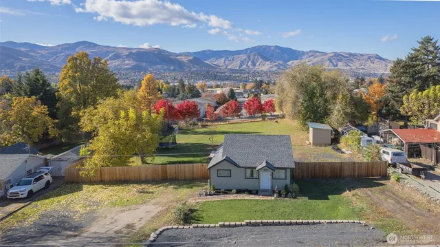 an aerial view of a house with a garden