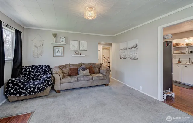 a living room with furniture and a couch