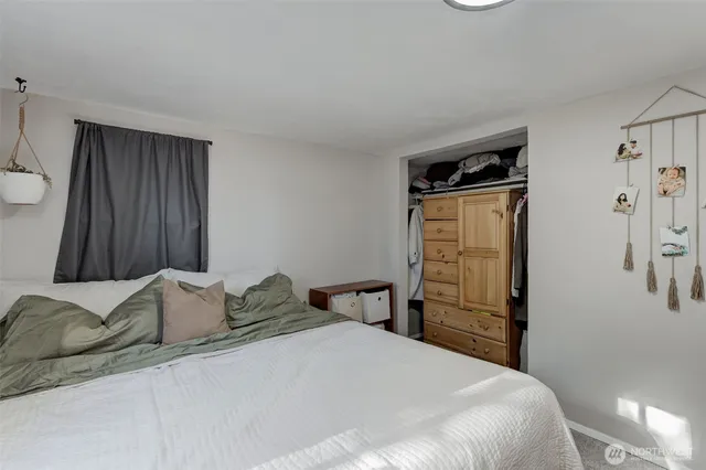 a kitchen with cabinets appliances and a sink