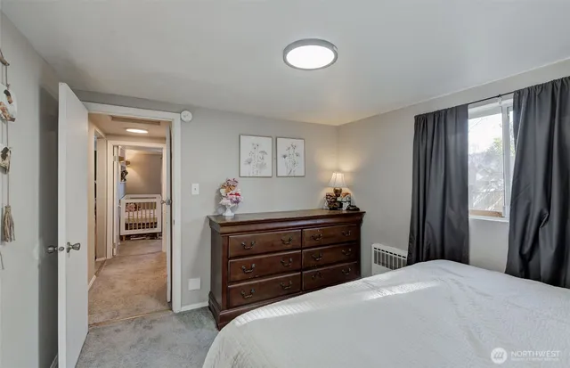 a kitchen with stainless steel appliances a refrigerator sink and cabinets