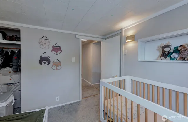 a bathroom with a bathtub and a window