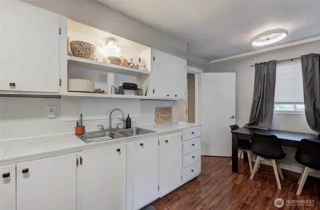 an aerial view of residential houses and outdoor space