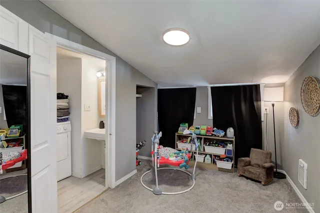 an aerial view of residential building with outdoor space and river