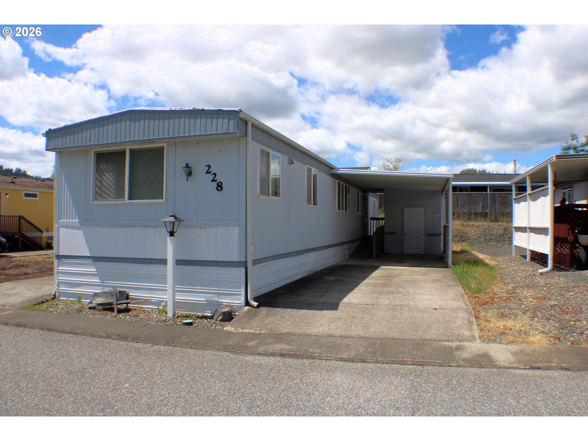 228 Estate Loop Winston, OR 97496 - Photo 3 of 19 a view of a house with backyard