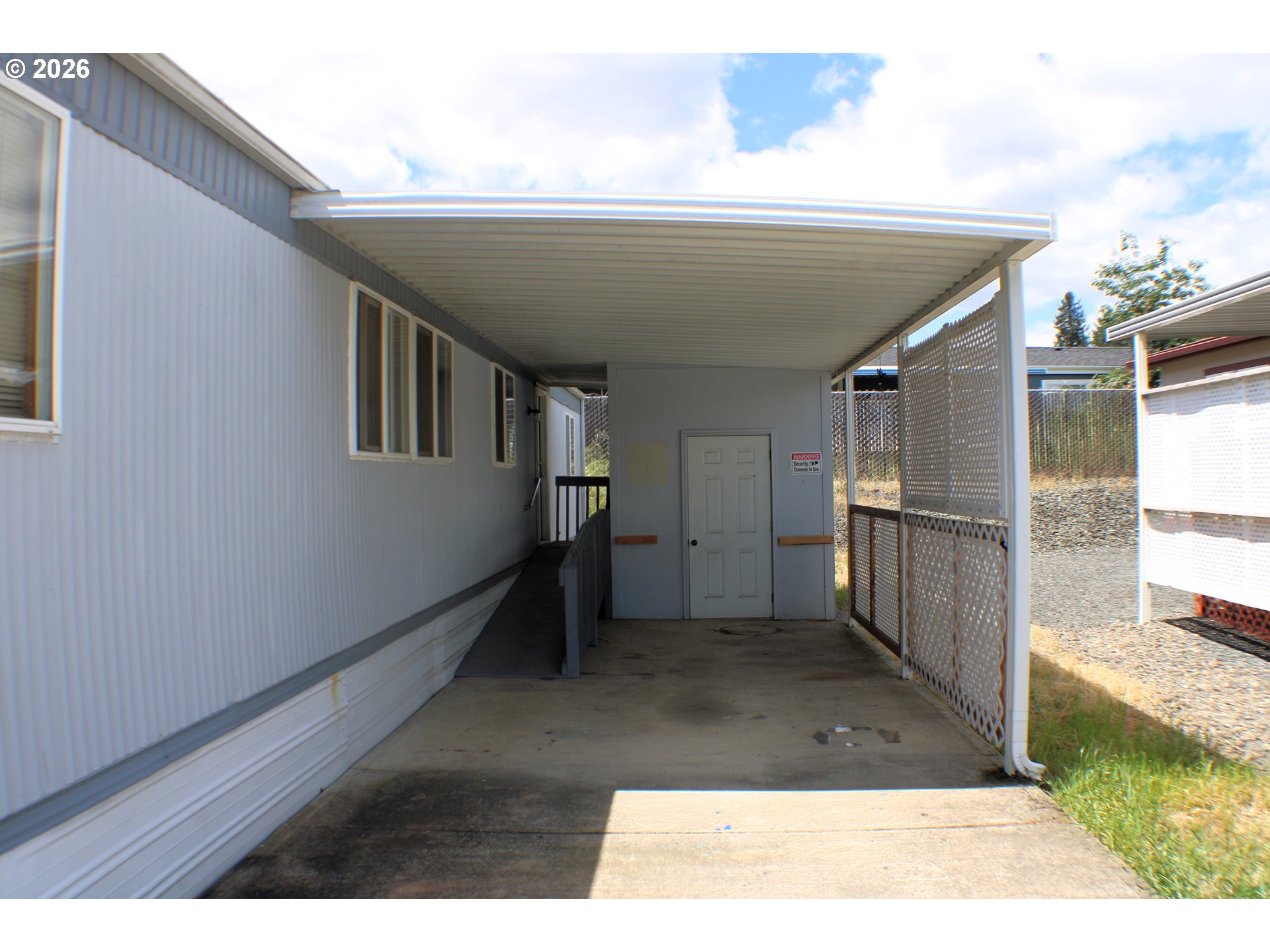 228 Estate Loop Winston, OR 97496 - Photo 4 of 19 a view of entryway and hall with wooden floor