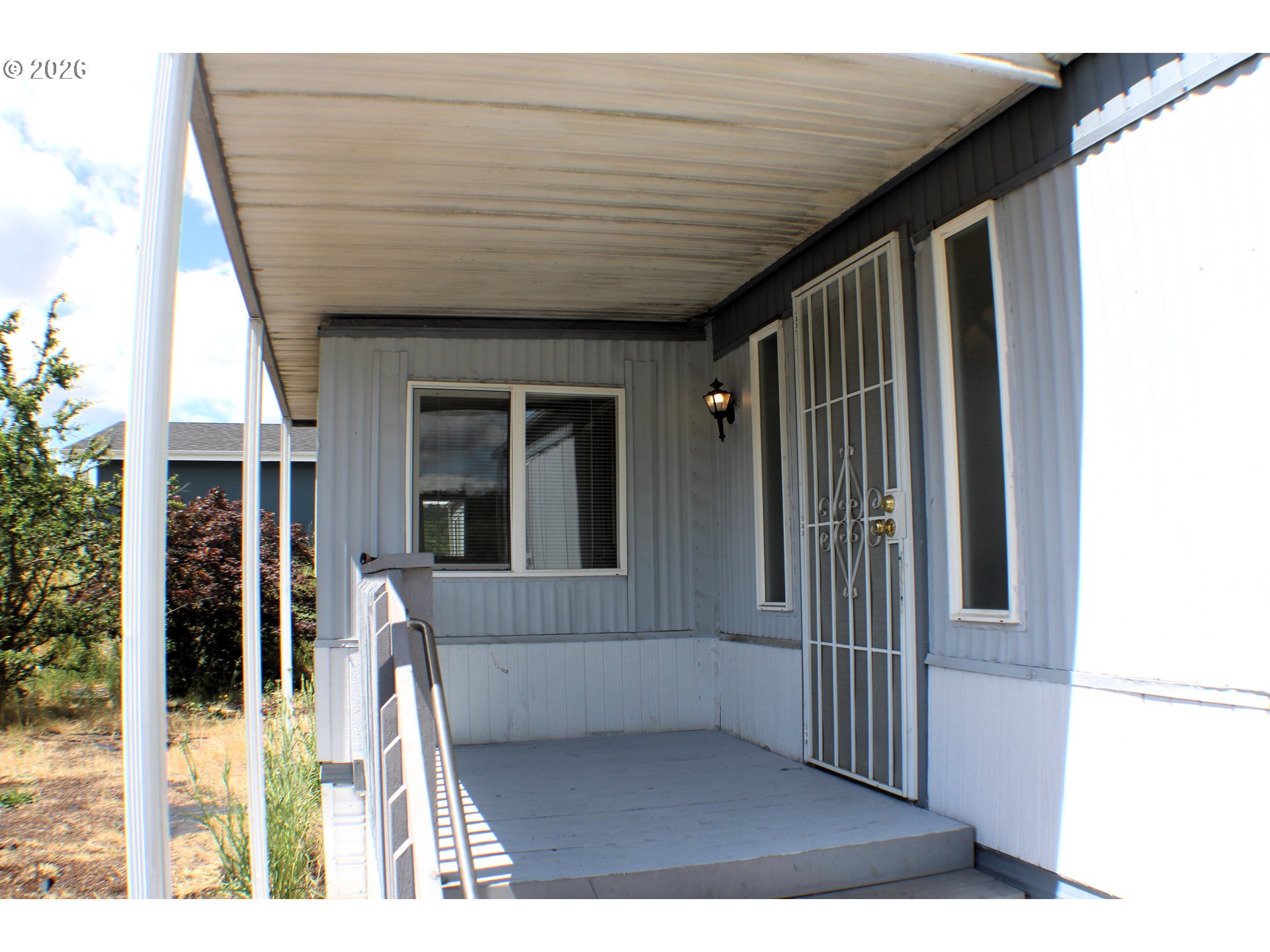 228 Estate Loop Winston, OR 97496 - Photo 7 of 19 a view of a porch