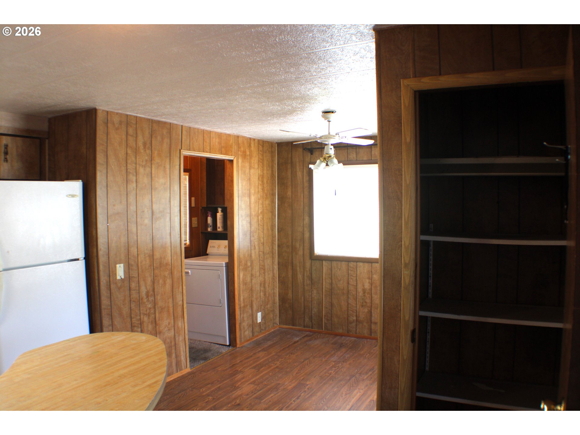 228 Estate Loop Winston, OR 97496 - Photo 9 of 19 a view of hallway with wooden floor