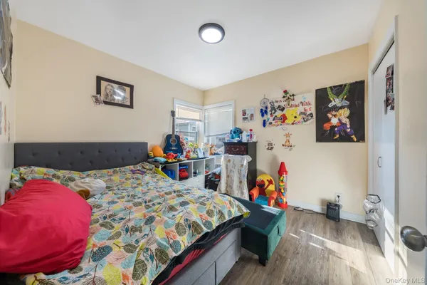 a bed room with a bed and a couch