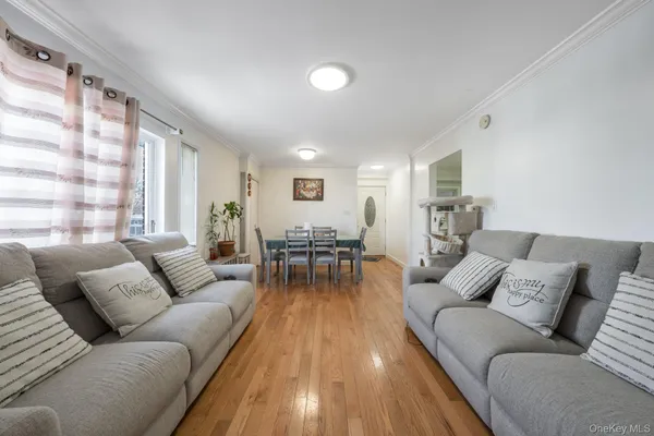 a living room with furniture and a table