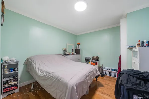 a bedroom with a bed and closet