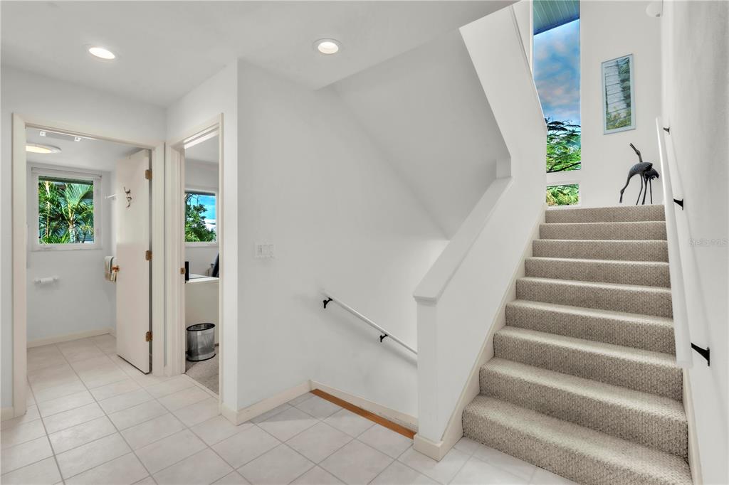 103 Sunset Lane Anna Maria, FL 34217 - Photo 12 of 54 a view of entryway and hall with a front door