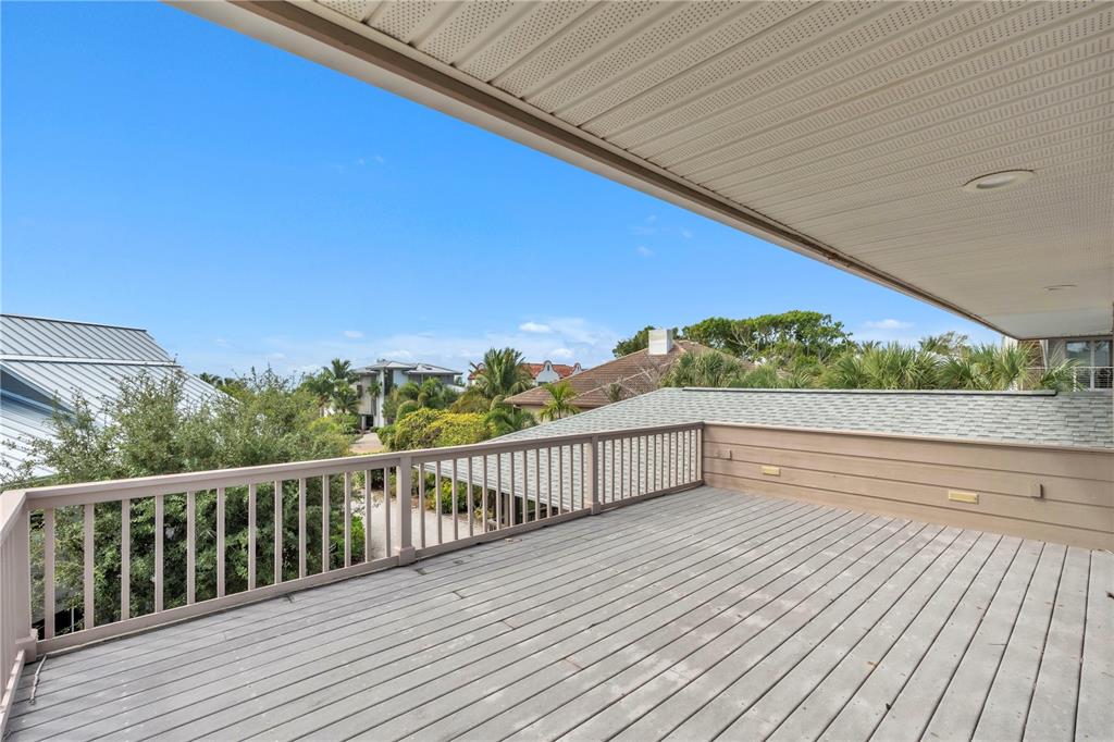 103 Sunset Lane Anna Maria, FL 34217 - Photo 45 of 54 a view of balcony with wooden floor