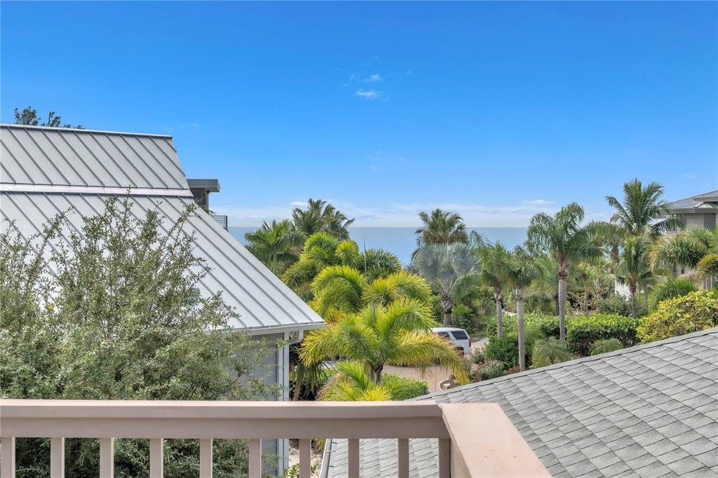 103 Sunset Lane Anna Maria, FL 34217 - Photo 46 of 54 a view of balcony with a garden