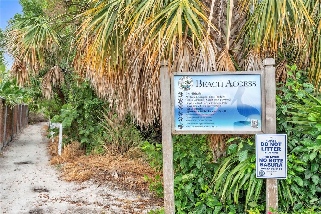 103 Sunset Lane Anna Maria, FL 34217 - Photo 49 of 54 a sign that is on the side of the road