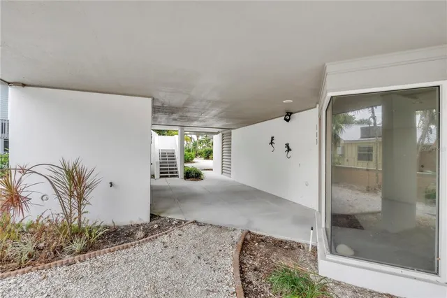 a kitchen with a stove a sink and a refrigerator