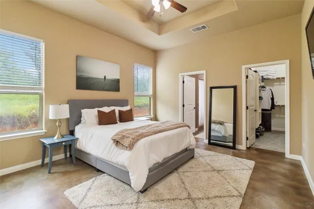a bathroom with a granite countertop sink double and mirror
